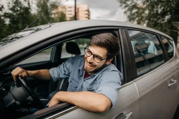 driver on his car on road